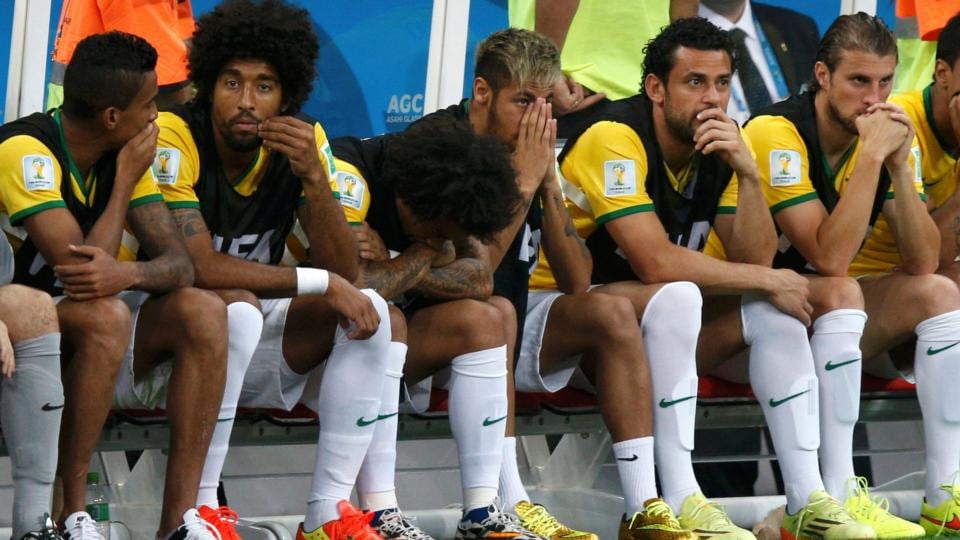 Brazil’s Neymar (fourth left) and teammates react after Netherlands’ third goal at the Brasilia National Stadium. Photograph: Ueslei Marcelino / Reuters