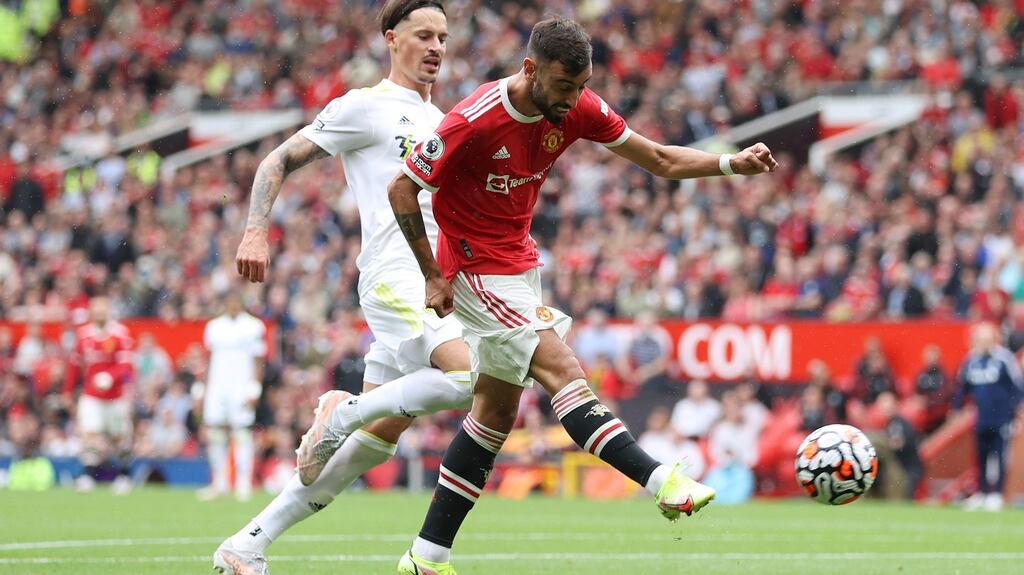 Bruno Fernandes completes his hat-trick in scoring Manchester United’s fourth goal during the Premier League game against Leeds United at Old Trafford. Photograph: Catherine Ivill/Getty Images
