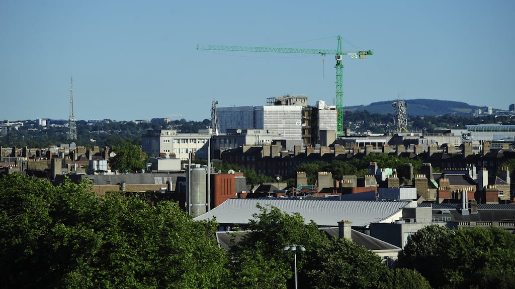 Construction cranes on Dublin skyline: current forecasts indicate direct property investment will be less than €2 billion this year. Photograph: Aidan Crawley