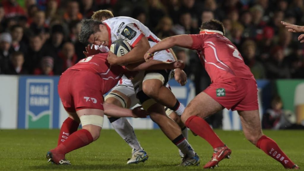 Nick Williams of Ulster is tackled by Emyr Phillips and Samson Lee of Scarlets at Ravenhill last weekend. Photograph: Charles McQuillan/Getty Images