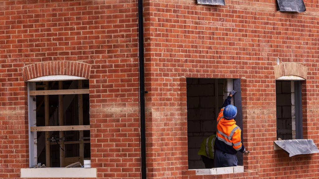 Construction workers on a Persimmon Plc residential property construction site in Chelmsford, on Monday. Photograph: Jason Alden/Bloomberg