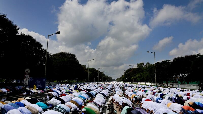 Muslims offer Eid al-Fitr prayers in Kolkata, India on Monday. Photograph: Bikas Das/AP.