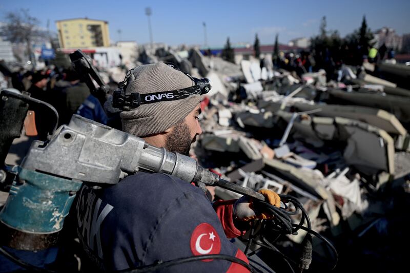 A rescue official in Kahramanmaras, Turkey. Photograph: Ozan Kose/AFP via Getty Images