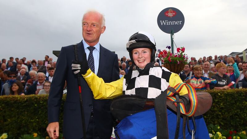 Jody Townend celebrates with Great White Shark’s trainer Willie Mullins . Photograph: James Crombie/Inpho