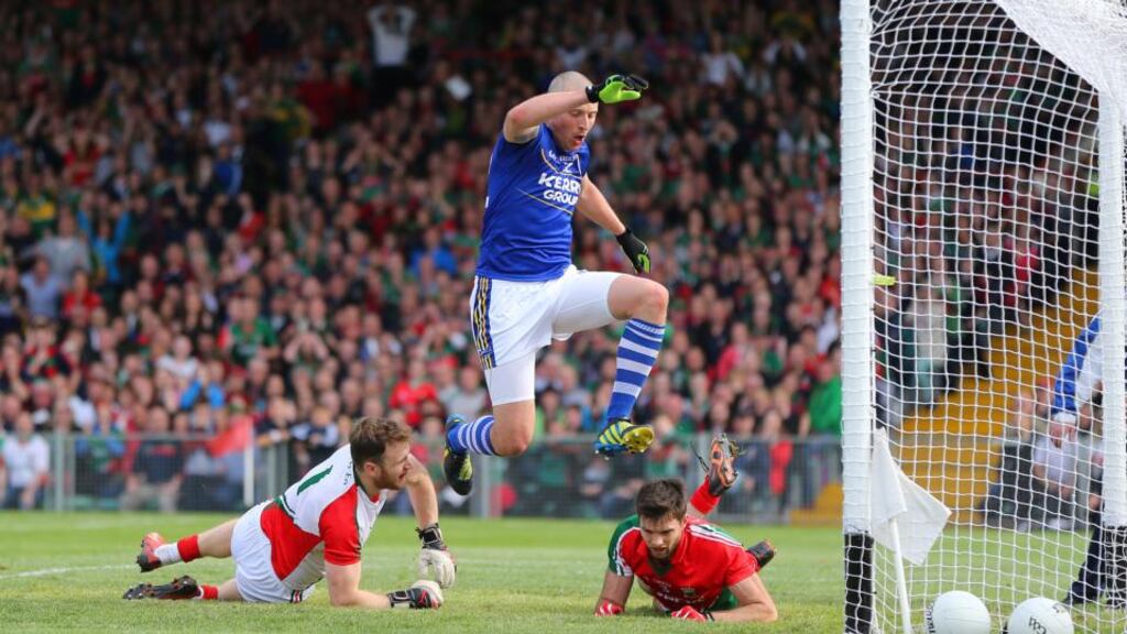 Kerry’s Kieran Donaghy finds the Mayo net in last year’s All-Ireland semi-final replay in Limerick. Of the four teams that have contested All-Irelands in the past five seasons, Mayo have consistently conceded more goals than Dublin, Donegal and Kerry. photograph: Cathal Noonan/Inpho