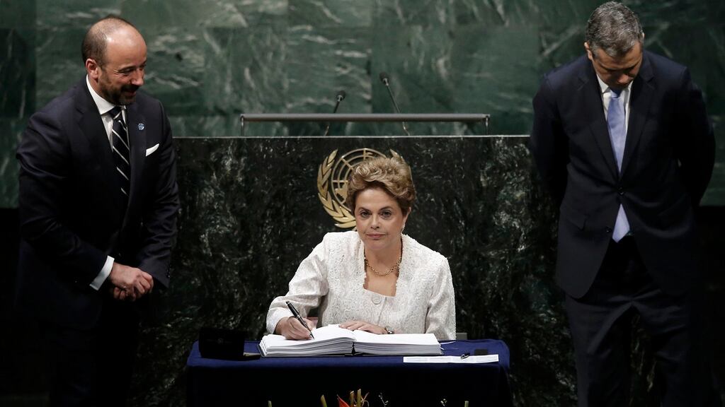 Brazilian President Dilma Rousseff signs the Paris Agreement on climate change at United Nations Headquarters in Manhattan, New York. Photograph: Mike Segar/Reuters