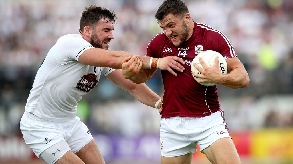 Kildare’s Fergal Conway with Damien Comer of Galway at St Conleth’s Park on July 22nd. Galway did Kerry a favour by beating Kildare in that phase 2 quarter-final. Photograph: Ryan Byrne/Inpho