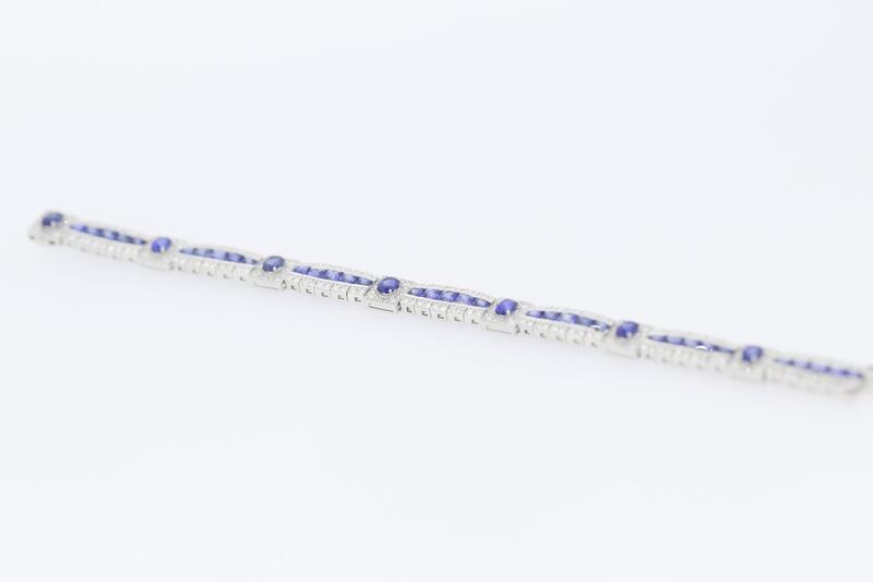 Sapphire and diamond cluster set link bracelet (€4,000-€7,000)