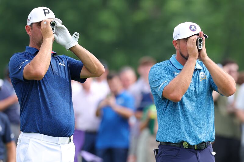 Gary Woodland (left) and Bryson DeChambeau using rangefinders at the 17th tee during Friday's action at the US PGA. Photograph: Kevin C. Cox/Getty Images