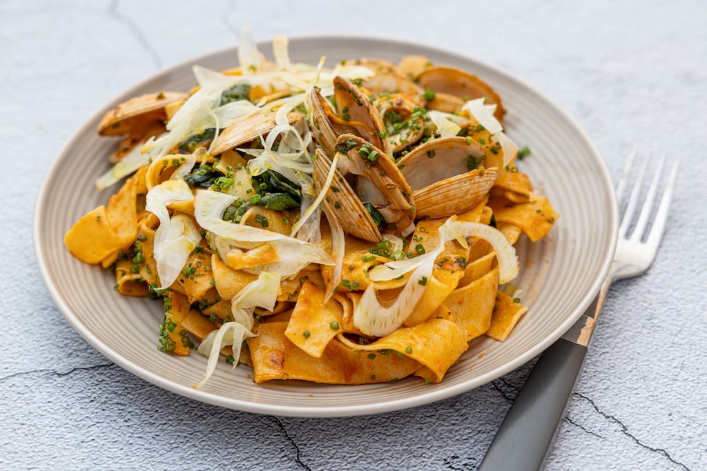 Home-made gluten-free pasta with nduja and clams. Photograph: Harry Weir