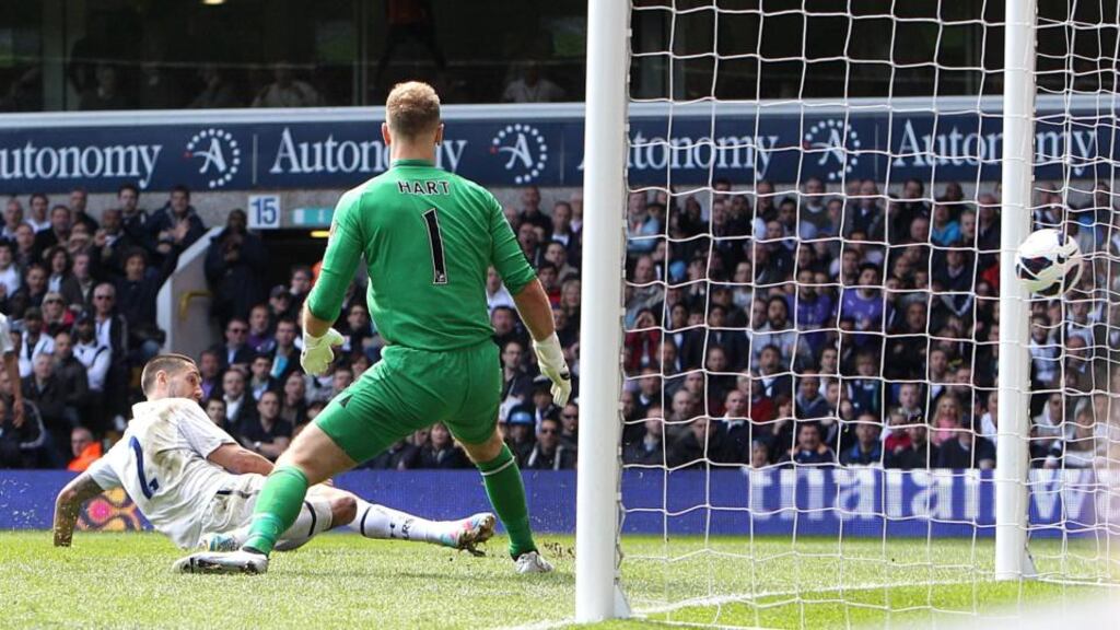 Tottenham Hotspur's Clint Dempsey scores his team’s first goal against Manchester City. Photograph: John Walton/PA Wire