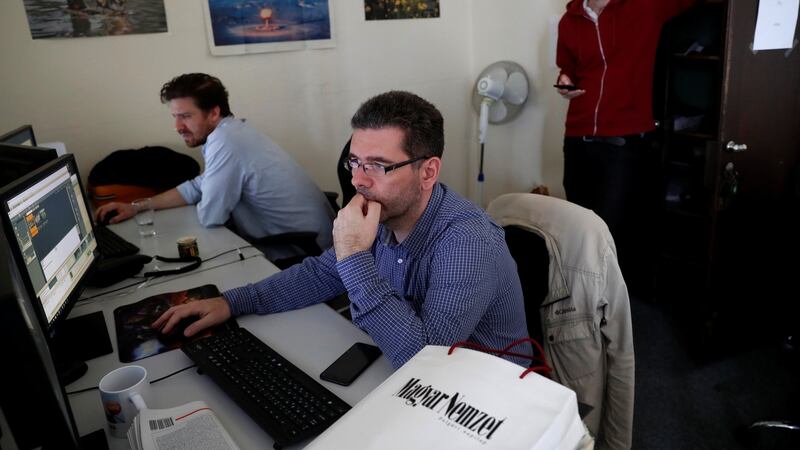 Journalists of Hungarian broadsheet daily “Magyar Nemzet”: paper is closing after 80 years in print. Photograph: Bernadett Szabo