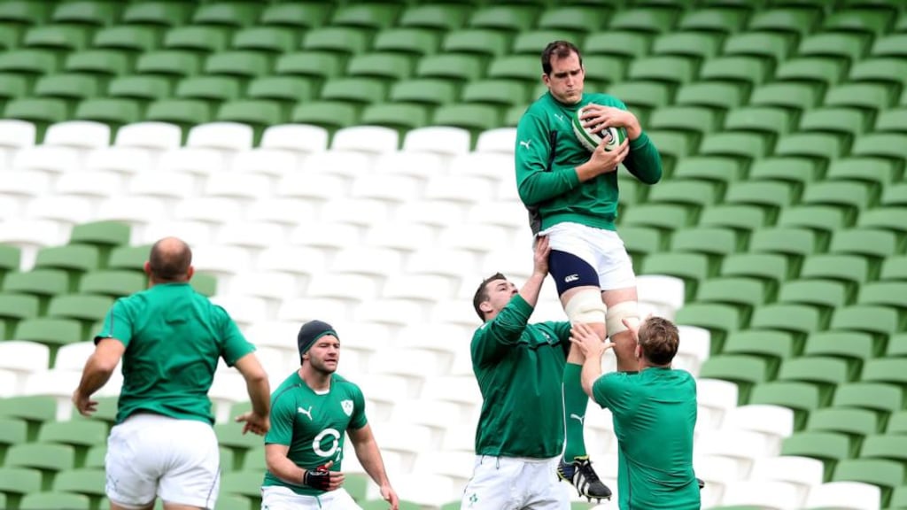 Ireland’s Devin Toner is lifted by Cian Healy (left) and Jamie Heaslip (right) as Fergus McFadden looks on during the captain’s run at the Aviva Stadium in Dublin. Photograph: Brian Lawless/PA