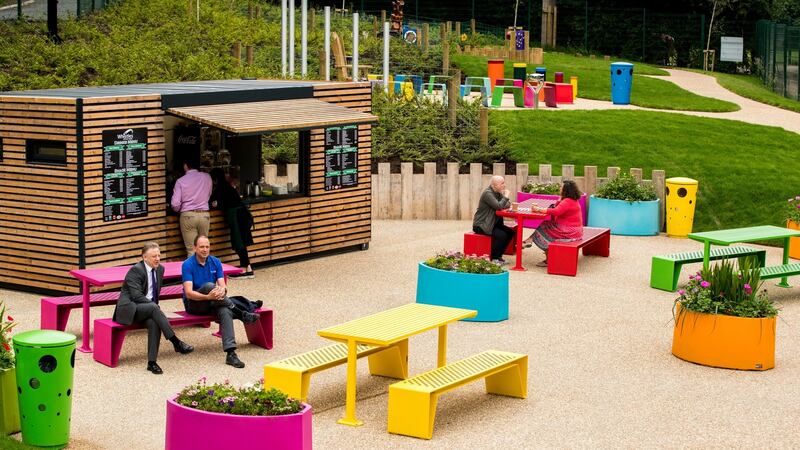 People relax in the Whistles @ The Park coffee bar during the reopening of the Mo Mowlam play park at the Stormont estate in Belfast.  Photograph: Liam McBurney/PA Wire