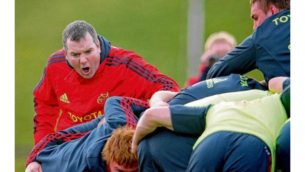 Anthony Foley exhorts the Munster forwards during training. photographs: inpho
