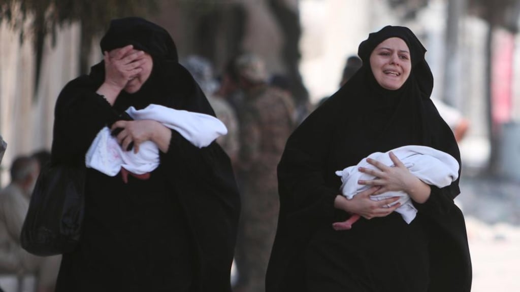 Women with newborn babies after they were evacuated by the Syria Democratic Forces (SDF) fighters from an Islamic State-controlled neighbourhood of Manbij, in Aleppo. Photograph: Rodi Said/Reuters