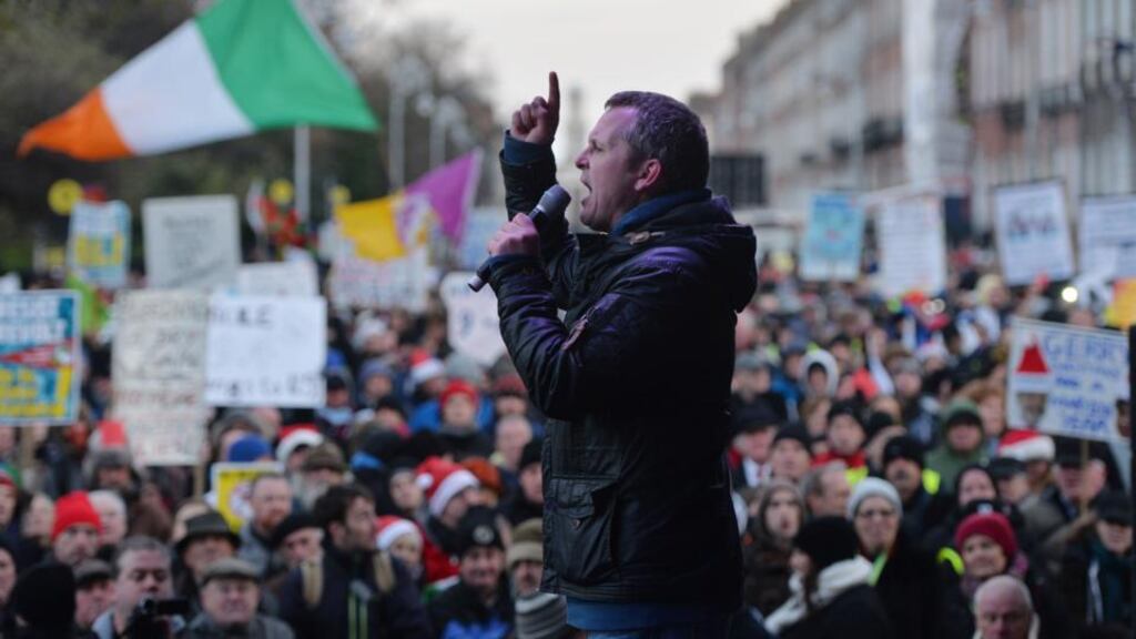 Richard Boyd Barrett addresses participants at an anti-water charge demonstration . File photograph: Alan Betson / The Irish Times
