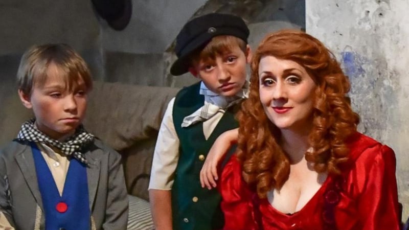 Róisín Sullivan as Nancy with some of the cast of street urchins in Oliver! at the National Concert Hall in Dublin