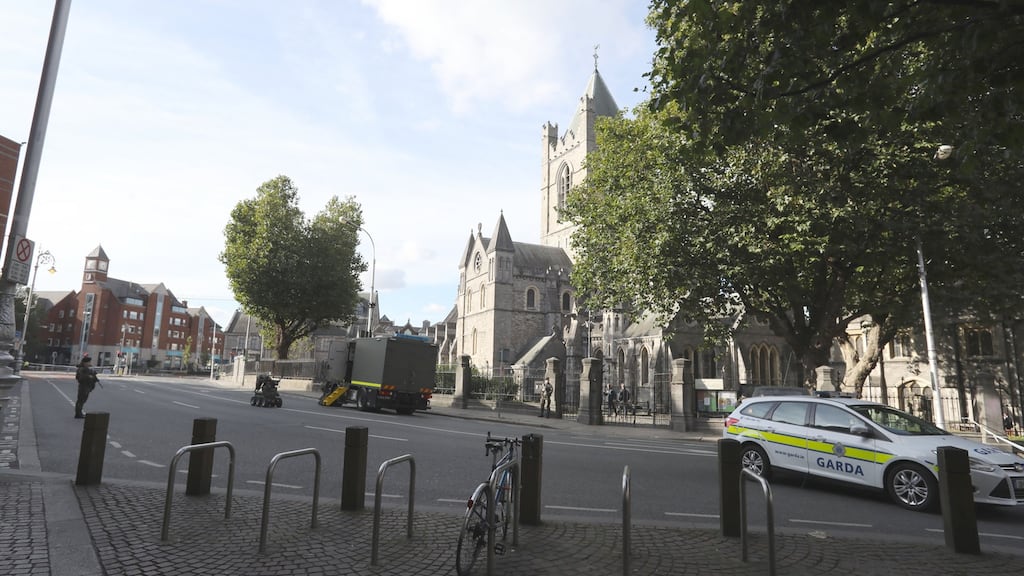 Gardaí and the Defence Forces’ Explosive Ordnance Disposal unit seal off the area around Christchurch cathedral in Dublin city centre on Monday. Photograph: Collins