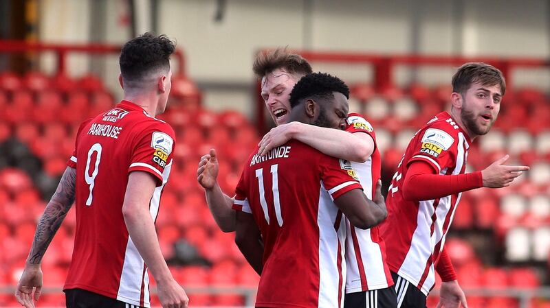 Derry’s James Akintunde celebrates scoring an injury time equaliser against Longford. Photograph: Lorcan Doherty/Inpho