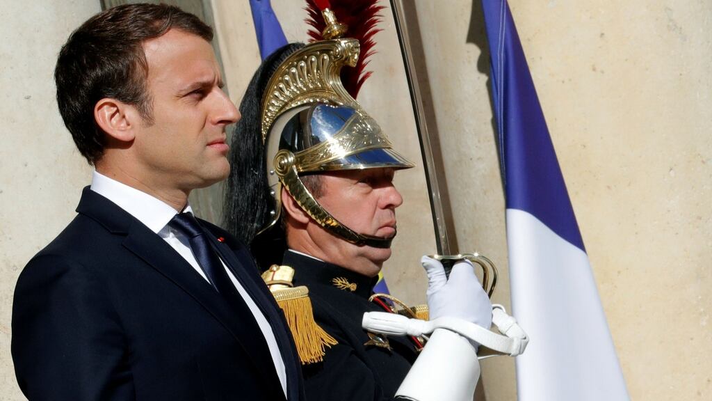 French President Emmanuel Macron waits for a guest at the Elysee Palace in Paris, France, June 12, 2017. REUTERS/Philippe Wojazer