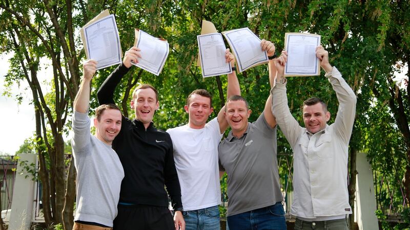Adult learners get their results at Pearse College, Crumlin: Gordon Elder; Liam Kieran; Lee Cummins; Michael Barry and Jonathan Lumsden. Photograph: Nick Bradshaw