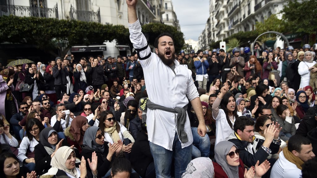 Student doctors and dentists stage a sit-in outside La Grande Poste in Algiers in February 2018, in protest against compulsory civil service. Photograph: Ryad Kramdi/AFP/Getty Images