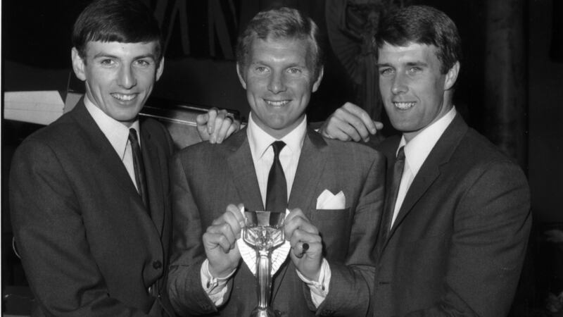 Martin Peters (left) pictured  with fellow West Ham players  Bobby Moore and Geoff Hurst with the Jules Rimet World Cup trophy after England’s 4-2 win over West Germany in the final at Wembley. Photograph: Central Press/Getty Images