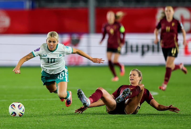 Denise O'Sullivan is fouled by Belgium's Ella Van Kerkhoven. Photograph: Ryan Byrne/Inpho