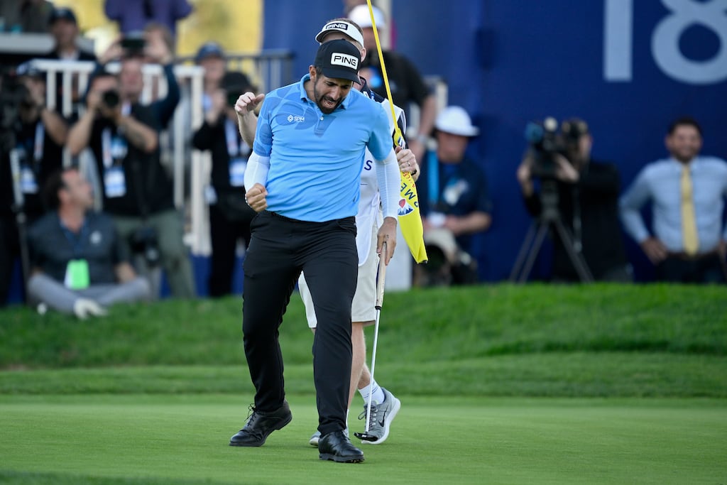 France's Matthieu Pavon celebrates on the 18th green after making birdie to win the Farmers Insurance Open at Torrey Pines South in La Jolla, California. Photograph: Orlando Ramirez/Getty Images