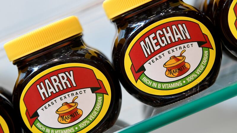 A shelf display of Marmite spread with a redesigned label for the forthcoming wedding. Photograph: Toby Melville/Reuters