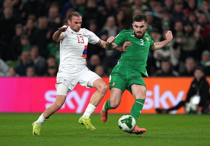 Armenia's Kamo Hovhannisyan tackles Republic of Ireland's Ryan Manning. Photograph: Niall Carson/PA