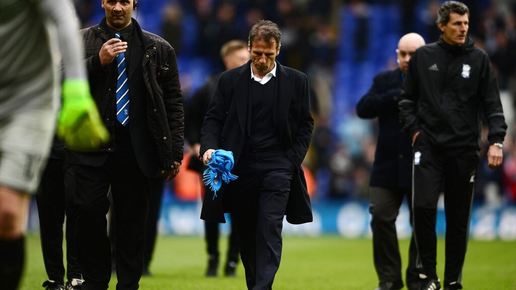 Gianfranco Zola cuts a dejected figure as he leaves the pitch at the final whistle at St Andrews on Monday. Photograph: Harry Trump/Getty Images