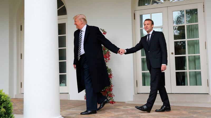 Former US president Donald Trump and Emmanuel Macron in 2018. Photograph: Pablo Martinez Monsivais/AP