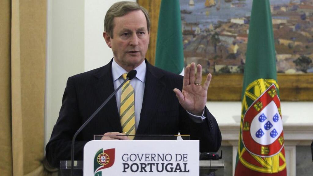 In Lisbon yesterday for talks with Portuguese prime minister Pedro Passos Coelho, Taoiseach Enda Kenny said: “I am required by my office, as head of Government to deal with the Constitution and therefore deal with what is in the Constitution and that is what I intend to do.” Photograph: AP Photo/Francisco Seco