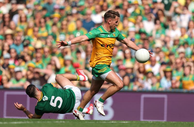 Peadar Mogan of Donegal steals a yard on Meath's Donal Keogan during the All-Ireland SFC semi-final. Photograph: Bryan Keane/Inpho