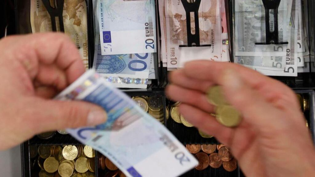 Average weekly earnings in the public sector in the second quarter of this year were €919, almost €300 higher than €622 recorded for the private sector. Photograph: Reuters/Michaela Rehle