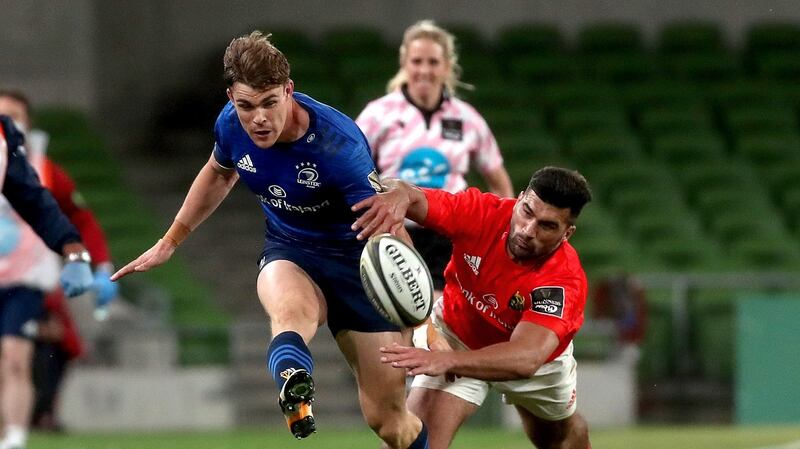 Leinster’s Garry Ringrose and Damian de Allende of Munster at close quarters during the match. Photograph: Inpho