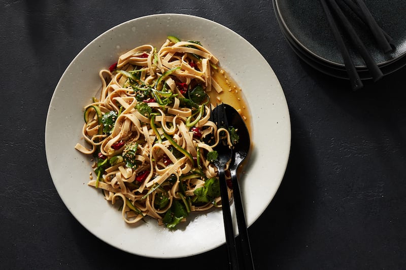 Cut fresh tofu sheets into strips for a perfect shredded tofu salad. Photograph: Bobbi Lin/The New York Times