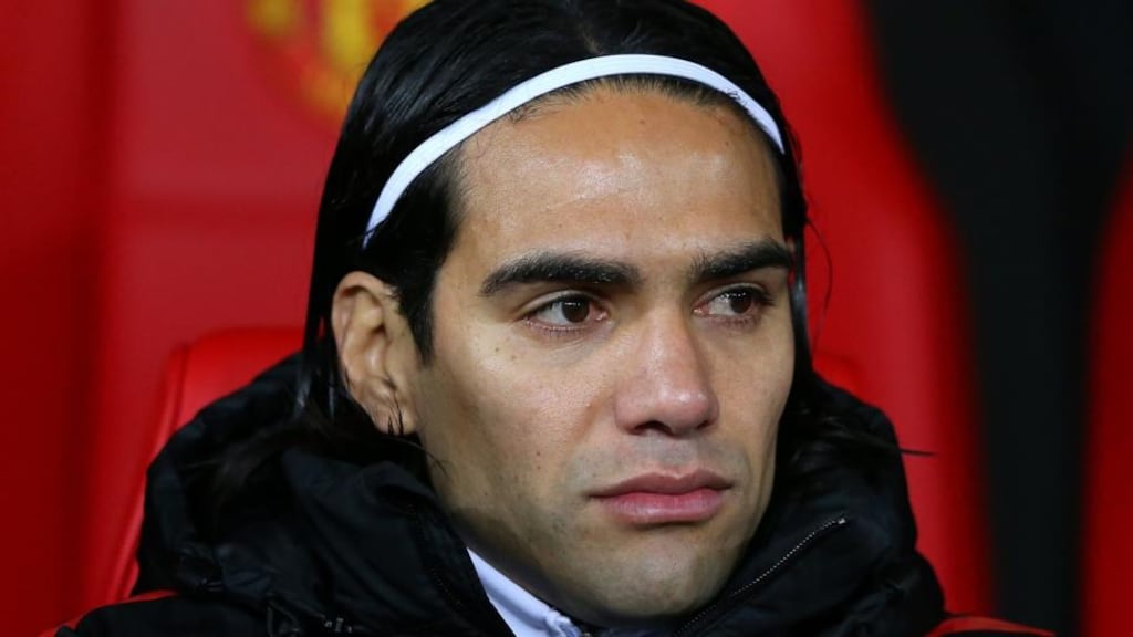 Radamel Falcao of Manchester United looks on from the bench. Photograph: Alex Livesey/Getty Images