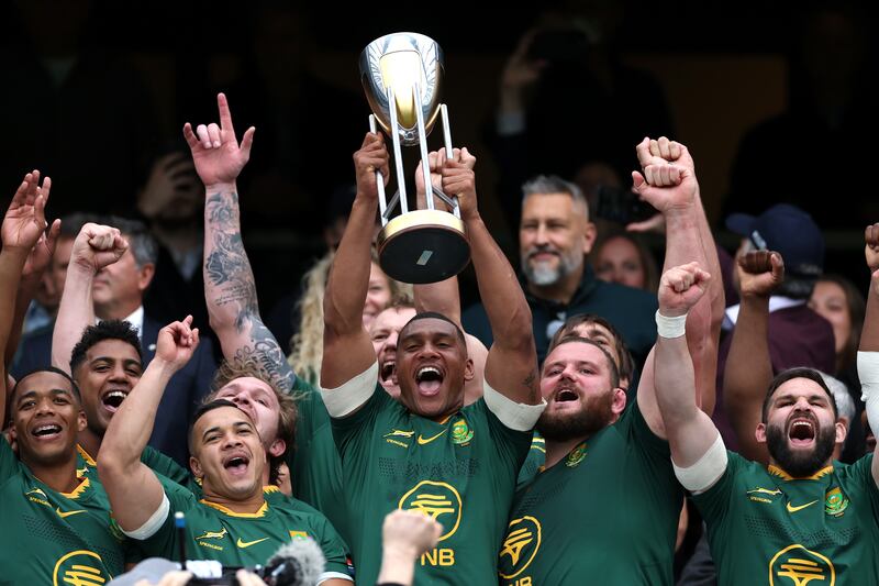 Damian Willemse of South Africa lifts the Rugby Championship trophy. Photograph: Ryan Pierse/Getty