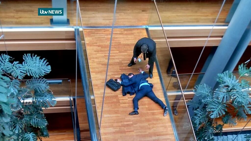 UK Independence Party MEP Steven Woolfe lying on a walk-way inside the European Parliament building in Strasbourg on Thursday. Photograph: AFP/Getty Images