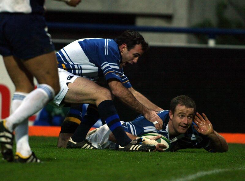 Denis Hickie scores the winning try for Leinster against Montferrand. Photograph: Billy Stickland/Inpho