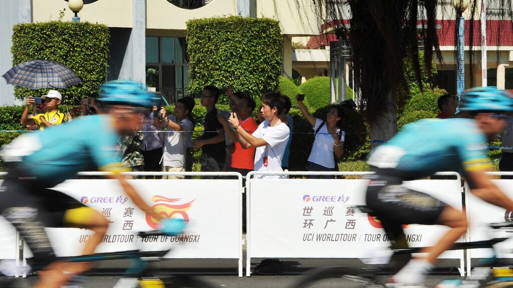 Cyclists compete in the Tour of Guangxi cycling race in Beihai in China’s southern Guangxi region last week.  Photograph: AFP/Getty Images