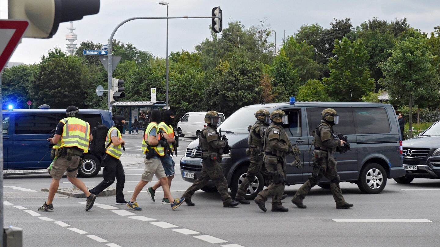 Police rush to the scene of a shooting in Munich, Germany. Photograph: Matthias Balk/EPA