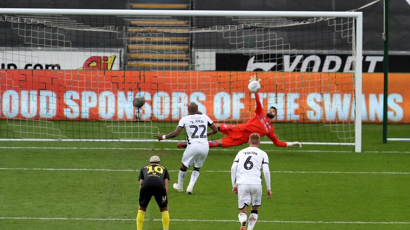 Swansea City’s Andre Ayew sees his penalty saved by Brentford goalkeeper David Raya Martin. Photograph: PA