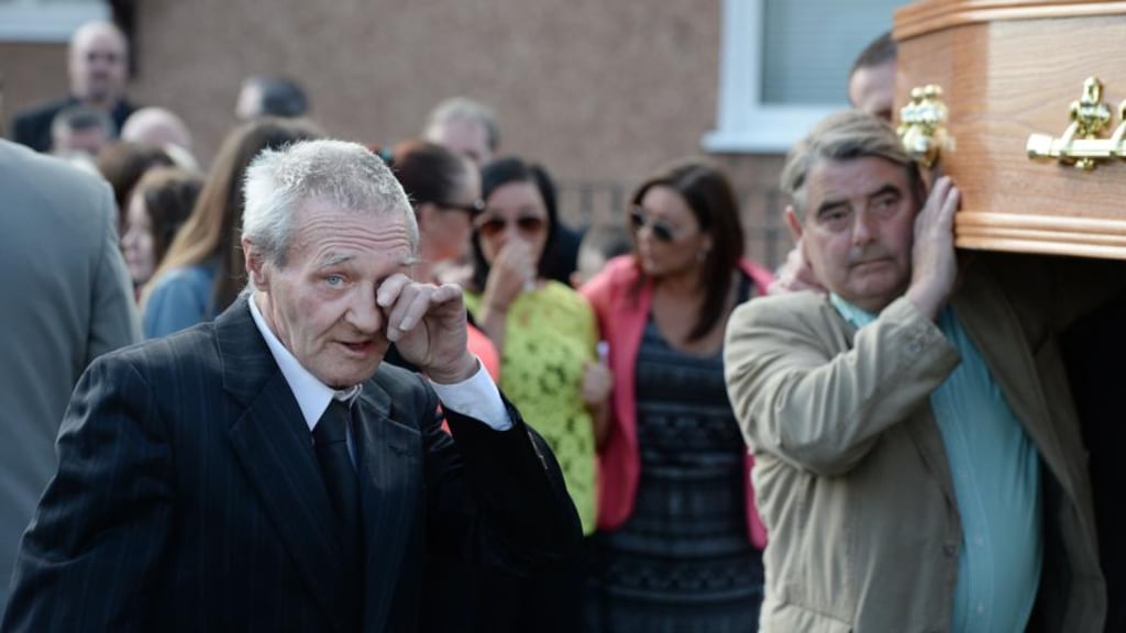 One of the Birmingham Six, Paddy Hill wipes a tear as the coffin of Gerry Conlon is carried into St. Peter’s Cathedral for his funeral Mass in Belfast today. Photograph: Charles McQuillan/Getty Images