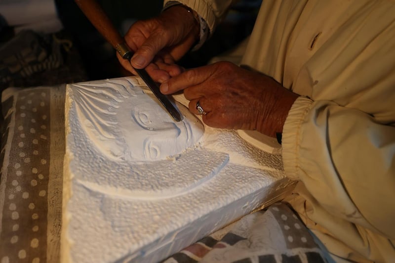 Stuart at work on a carving. Photograph: Nick Bradshaw/The Irish Times