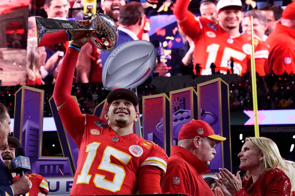 Kansas City Chiefs' quarterback Patrick Mahomes celebrates with the trophy after the Super Bowl win in Las Vegas. Photograph: Timothy Clary/AFP/Getty Images