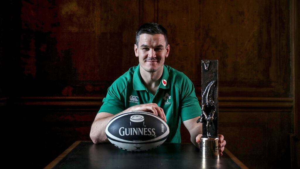 Johnny Sexton with his Guinness Rugby Writers’ of Ireland Player of the Year Award. Photograph: Dan Sheridan